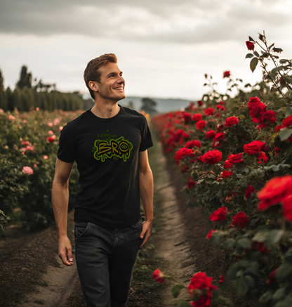 Man walking through a rose garden wearing a black t-shirt with green logo.