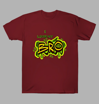 Maroon t-shirt with yellow and green graphic design on a gray background