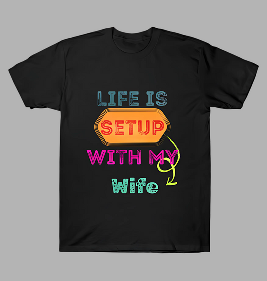 Black t-shirt with colorful text design on a gray background